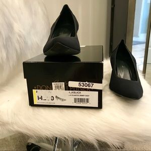 Donald Pliner black low heeled shoes.